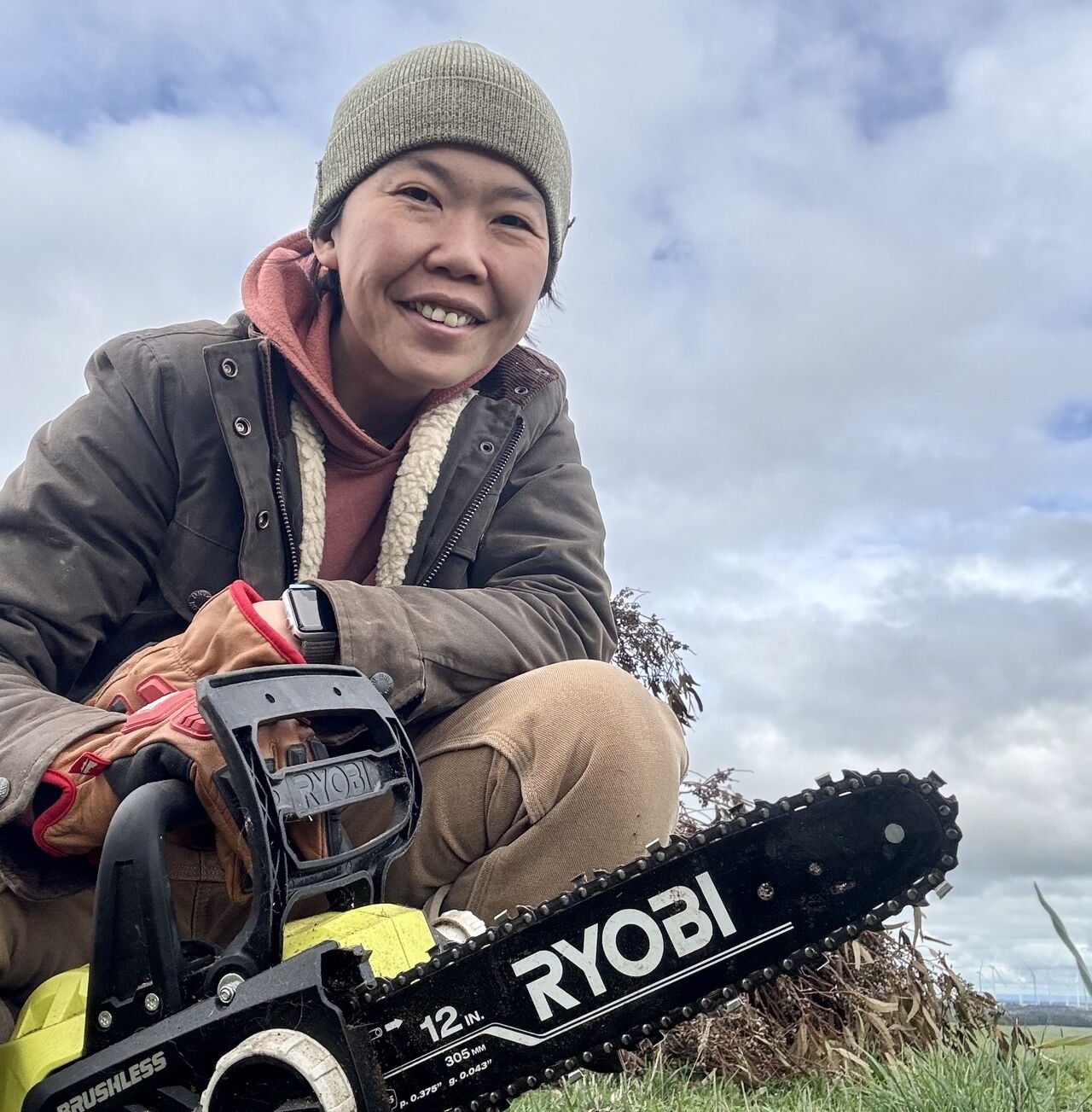 Li Ping with chainsaw