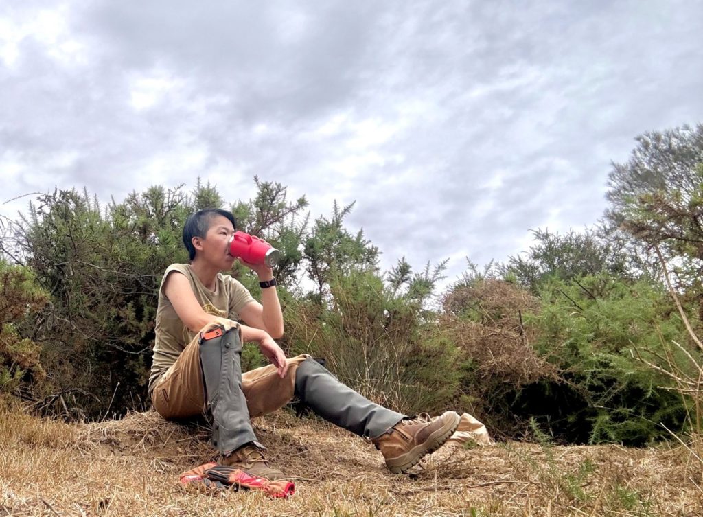 Li Ping Thong resting and taking a drink.